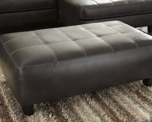 Nokomis Signature Design by Ashley Ottoman